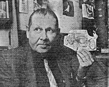 Bill Truitt with a picture of his 1920 air car